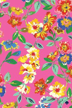 a pink background with colorful flowers and leaves