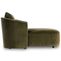 an olive green velvet chaise lounge chair