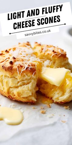 a close up of food on a plate with text that reads light and fluffy cheese scones