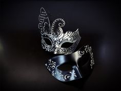 Womens butterfly mask in silver and black and men's black mask with silver filigree. Prom Mask, Couples Prom, Silver Masquerade Mask, Couples Masquerade Masks, New Year Eve Party, She Mask, New Year Eve, Masks Masquerade, Costume Mask