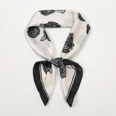 Elevate your style with our Chic and Versatile Printed Small Square Scarf for Fashionistas. This impeccably designed scarf is the perfect addition to any outfit, offering both fashion and function. Made with high-quality materials, it's lightweight and easy to style in multiple ways. Embrace your inner fashionista with this must-have accessory. Color : Black and White Material : Polyester Composition : 100% Polyester Element : Plants Product Technique : Printing Length Width 27.6 27.6 Chic White Scarves As Gift, Chic White Scarf As Gift, Chic White Scarf For Gift, Chic White Scarf As A Gift, Trendy Black Silk Scarf For Spring, Trendy White Silk Scarf, Black Silk Scarf For Spring Gift, Casual Black Silk Scarf For Spring, Black Silk Scarf As Summer Gift