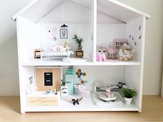 a doll house with all the furniture and accessories