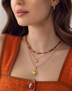 This dainty necklace, designed to sit at the chest, features double-sided red enamel bar links. The perfect chain to add a gorgeous pop of red to your necklace layers or wear alone for a delicate look.Soru Charms can also be added to this chainBehind the name: Named after the Etruscan goddess of spells Carmenta, known for chanting songs to ease the pain of women.Materials18ct gold plated silver and enamelChain length (approx)16" 10cm extender Red Pendant Jewelry With Delicate Chain, Elegant Red Delicate Chain Necklace, Red Pendant Necklace With Chain, Red Chain Choker Necklace, Red Pendant Chain Necklace With Clavicle Chain, Red Clavicle Chain Pendant Necklace, Red Double Strand Beaded Chain Jewelry, Biblical Times, Necklace Layers