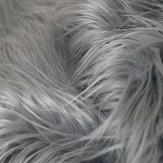 Charcoal Gray Shaggy Long Pile Faux Fur Fabric (4) - Fashion Fabrics LLC Silver Texture, Grey Fur, Shirting Fabric, Textile Company, Fur Fabric, Faux Fur Fabric, Fur Fabrics, Royale High, Muslin Fabric