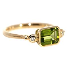 9ct Yellow Gold Dress Ring containing a 1.74ct emerald cut Peridot & 2 J, SI round cut Diamonds equaling .03ct, all bezel set. Size O, but can be resized upon request. Peridot Ring Gold, Yellow Gold Dress, Diamond Dress Ring, Tourmaline Engagement Ring, Emerald Cut Ring, Diamond Dress, Emerald Cut Rings, Dress Ring, Bezel Ring