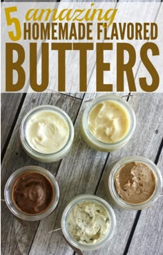 five jars filled with homemade flavored butters sitting on top of a wooden table