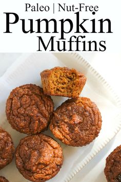 pumpkin muffins on a white plate with the words paleo nut - free pumpkin muffins