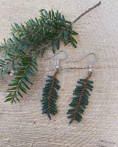 This pair of beaded earrings were inspired by the big hemlock tree growing in my front yard. Earrings are 1 and a 1/2" long and made with size 11 delicas. Made to look very realistic Beaded Tree Earrings, Christmas Tree Beaded Earrings, Nature-inspired Beaded Dangle Earrings As Gift, Nature-inspired Dangle Beaded Earrings As Gift, Nature-inspired Dangle Beaded Earrings For Gift, Beaded Leaf Pattern, Metis Beaded Earrings, Indigenous Christmas, Delica Beaded Earrings