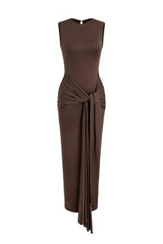 Step into sophistication with this sleek and elegant brown sleeveless maxi dress. Featuring a chic high neck and a form-fitting silhouette, this dress offers timeless style with a modern twist. The knotted front detail adds a touch of luxury, cinching at the waist to enhance your figure while elongating the body for an effortlessly refined look. Perfect for formal occasions, evening events, or a glamorous night out. High Neck Design: Offers a modest yet stylish neckline for a polished appearance. Sleeveless Cut: Provides comfort and a sleek, streamlined look. Knot Detail at Waist: Beautifully accentuates the waistline, adding elegance and shape. Maxi Length: Floor-length design for a sophisticated and elongated silhouette. Soft Stretch Fabric: Crafted from a high-quality, stretch fabric th Long Sleeve Activewear, Form Fitting Tops, Bodycon Maxi Dress, Elegant Maxi Dress, Bodycon Maxi Dresses, Denim Romper, Activewear Sets, Flowing Skirt, Maxi Dress Formal