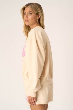 Meet you on the courts.The Pickleball Sweatshirt is inspired by the collegiate aesthetic we all can't get enough of. The playful pink graphic pops on our popular chalk colorway, creating the perfect combo of sporty and girly for spring. And, of course, you're guaranteed comfort with the baby French terry fabric. Pair with the Pickleball Short for the full outfit. 82% Cotton13% Polyester5% Spandex Care Instructions: Machine wash cold. Wash inside out with similar colors. Do not bleach. Lay flat t Logo Print Sweatshirt For Spring Loungewear, Oversized Retro Sweatshirt, Athleisure Logo Print Sweatshirt For Spring, Trendy College Sweatshirt For Spring, Spring Athleisure Sweatshirt With Logo Print, Sporty Sweatshirt With Ribbed Cuffs For Spring, Trendy Cotton Sweatshirt For Sports, Sporty Spring Sweatshirt With Ribbed Cuffs, Relaxed Fit Sweatshirt For College In Spring