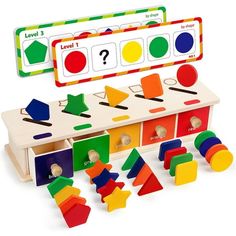 a wooden toy set with matching shapes and numbers