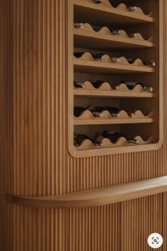 the inside of a sauna with wooden shelves