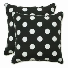 two black and white polka dot pillows