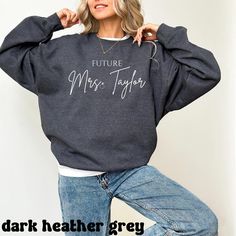 *If you would like a colour or size that is not listed, please contact us. Get ready for your new title with the Personalized Future Mrs. Sweatshirt! This custom shirt is perfect for celebrating your engagement and counting down the days to becoming a Mrs. Personalize it with your future last name to make it uniquely yours. Ideal for bridal showers, bachelorette parties, and cozy wedding planning days, this shirt is a fun way to share your excitement for the big day. 💍💖 🎨 Design Highlights: Customizable "Future Mrs. [Your Last Name]" text, featuring an elegant and timeless font 🖋✨ Soft, high-quality fabric that's comfortable for all-day wear--perfect for pre-wedding festivities 👕💖 Available in a variety of romantic colors and sizes, from XS to 5XL, to match your personal style 🌈👚 U Future Mrs Sweatshirt, Timeless Font, Cozy Wedding, Mrs Sweatshirt, Wedding Festivities, Bachelorette Trip, Personalized Bride, Romantic Colors, Future Mrs