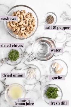 the ingredients to make cashews are shown in bowls on a marble countertop