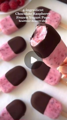 chocolate raspberry frozen yogurt pops on a plate