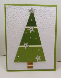 a card with a christmas tree on it