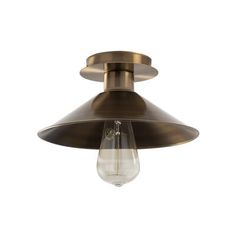 an antique brass ceiling light with a clear glass bulb hanging from it's side