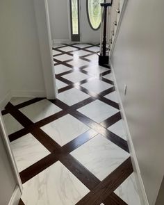 the hallway is clean and ready to be used as a home decorating area for guests