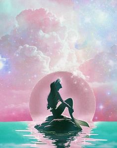 a mermaid sitting on top of a rock in the ocean under a pink and blue sky