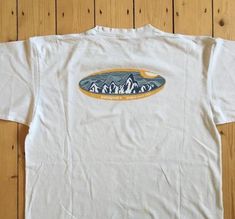 Vintage 90s Patagonia Logo Tee Shirt Outfits  Shirt Outfit Idea Easy 30 day return policy Vintage Surfer Outfits, 90s Patagonia, Patagonia Logo, Tee Shirt Outfit, Personalized T Shirt, Oval Logo, Logo Tshirt, Shirt Outfits, Logo Tee