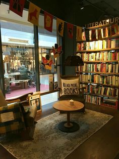 the library is filled with books and stuffed animals