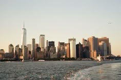 the skyline of new york city is seen from across the water