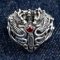 Red Garnet Medieval 925 Sterling Silver Dragon Ring ~New   100% solid sterling silver    Stamp.925 trademark inside the band    Weight : 23 Grams     Ring face measures: 20mm x 25mm     Our Red Garnet Medieval Sterling Silver Dragon Ring is an accessory you'll be hard-pressed to ignore. Blending the versatility of sterling silver with impressive detail, it speaks to the veterans of the bikers style race. It takes its inspiration from Medieval design - curved, majestic and ready to attach. Seemin Mens Garnet Ring, Medieval Ring, Onyx Ring Men, Medieval Design, Medieval Dragon, Medieval Rings, Gothic Ring, Dragon Ring, Gothic Earrings