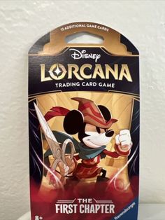 the disney trading card game is in its packaging