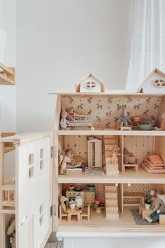 a doll house with all the furniture and accessories