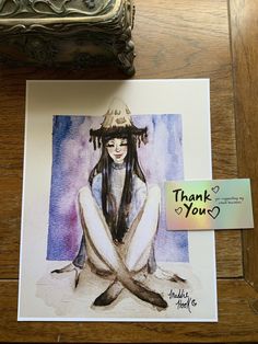 a watercolor painting of a woman sitting on the floor next to a note that says thank you