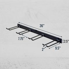 an image of a metal shelf with measurements for the top and bottom bars on it