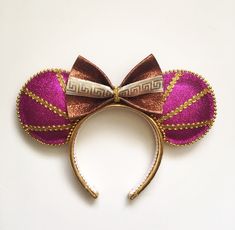 a close up of a minnie mouse ears headband