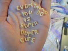 someone is holding out their hand with words written on it that read everything you do is super duper cute