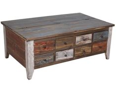 an old wooden table with drawers on it