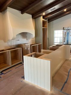 a kitchen being remodeled with cabinets and counters