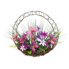 a basket filled with purple and white flowers