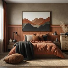 a bed with an orange comforter and pillows in front of a painting on the wall