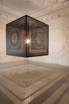 an image of a room that is made up of squares and circles with the light shining through