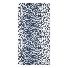 a blue and white animal print rug