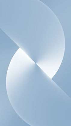 an abstract image of white curved shapes