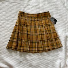 Nwt Pleated Schoolgirl Skirt. Gold/Yellow With Shades Of Green, Deep Red, White And Black. Side Button And Hidden Zipper. Unlined. 66% Polyester 32% Rayon 2% Spandex Gold Yellow Color, Yellow Pleated Skirt, First Day Of School Fits, Pleaded Skirt, Yellow Mini Skirt, Skirts Pleated, School Skirt, School Fit, Forever 21 Skirts