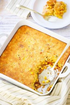 a casserole dish filled with corn and topped with a scoop of ice cream