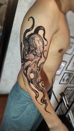 a man with an octopus tattoo on his arm