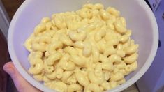 a white bowl filled with macaroni and cheese