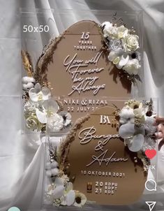 the wedding cake is decorated with flowers and leaves