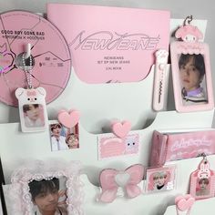 a white refrigerator with pink decorations and pictures on it