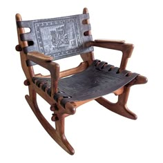 a wooden rocking chair with an iron seat