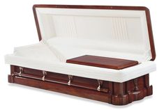 a wooden casket with white leather lining and wood trimmings on the sides, in front of a white background