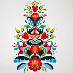 an image of colorful flowers and leaves on a white background